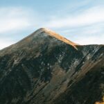 Mountain Landscapes - A breathtaking view of a majestic mountain peak #11960498