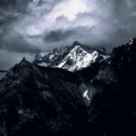 Mountain Landscapes - Moody mountain landscape with snow-capped peaks #17077984
