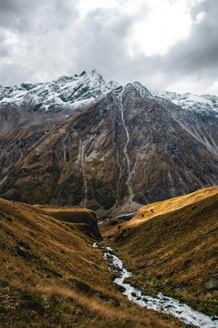 Mountain Landscapes - Breathtaking view of a snow-capped mountain and #17641872