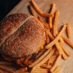 Food Aesthetics - Mouthwatering cheeseburger with crispy fries ser #22119675