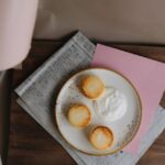 Food Aesthetics - Top view of pancakes with cream on a rustic tabl #24304621
