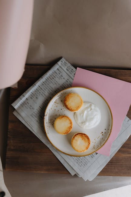 Food Aesthetics - Top view of pancakes with cream on a rustic tabl #24304621