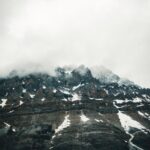 Mountain Landscapes - Dramatic, mist-covered mountain peaks in Banff N #27501744