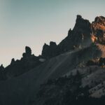 Mountain Landscapes - Majestic sunset view of rugged mountain peaks at #28820421