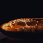 Food Aesthetics - A detailed close-up of an orange slice with text #30291268