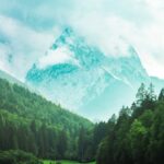 Mountain Landscapes - Serene view of a misty mountain rising above lus #30567606