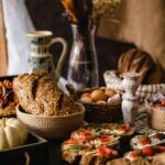 Food Aesthetics - Assorted breads with vegetables and decor on a r #30891219