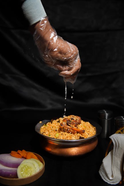 Food Aesthetics - Close-up of lemon juice being added to a bowl of #32825910