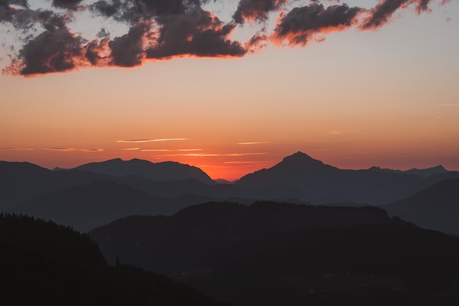 Mountain Landscapes - Breathtaking view of the mountains silhouetted a #33895879