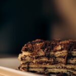 Food Aesthetics - Rich chocolate layered dessert on a plate, perfe #34159029