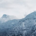 Mountain Landscapes - A captivating view of snow-covered mountains wit #35019313