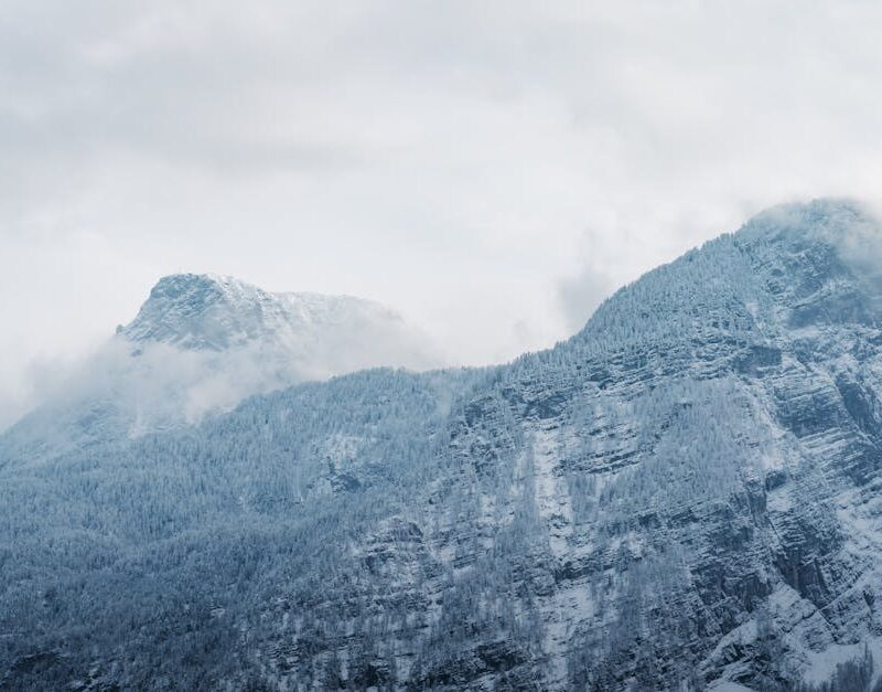 Mountain Landscapes - A captivating view of snow-covered mountains wit #35019313