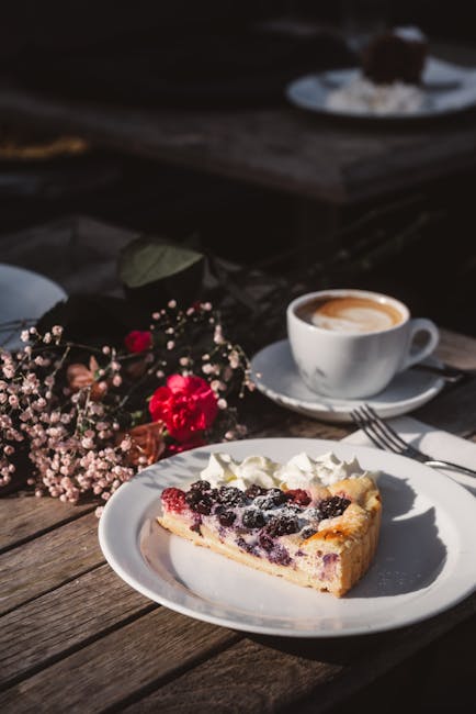 Food Aesthetics - Delicious berry tart slice on a plate with coffe #35121845