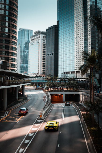 Luxury Cars - Dramatic cityscape with luxury cars amidst Hong #35486707