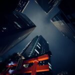 City Architecture - Dramatic view of Tokyo skyscrapers and a red tor #35537105