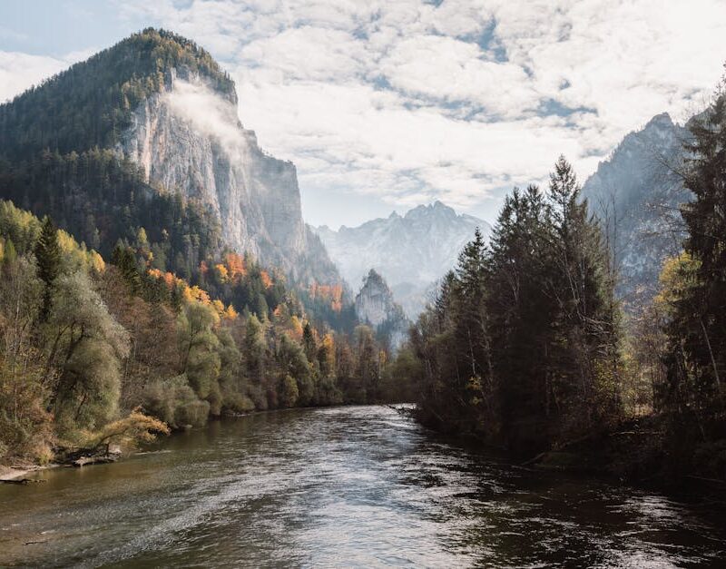 Mountain Landscapes - Stunning view of a river winding through Alpine #35927211