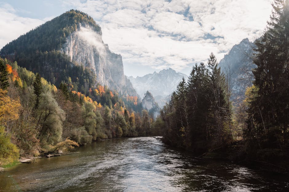 Mountain Landscapes - Stunning view of a river winding through Alpine #35927211