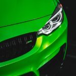 Luxury Cars - Close-up of a vibrant green sports car with focu #6597509