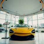 Luxury Cars - Stunning yellow sports car showcased in a modern #6732612
