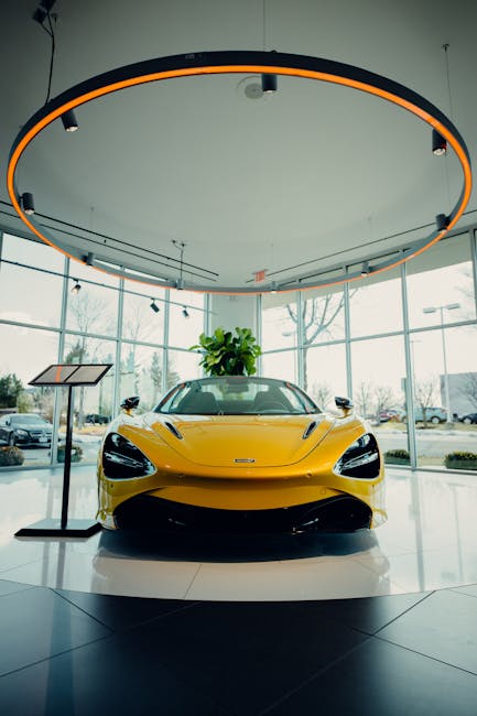Luxury Cars - Stunning yellow sports car showcased in a modern #6732612